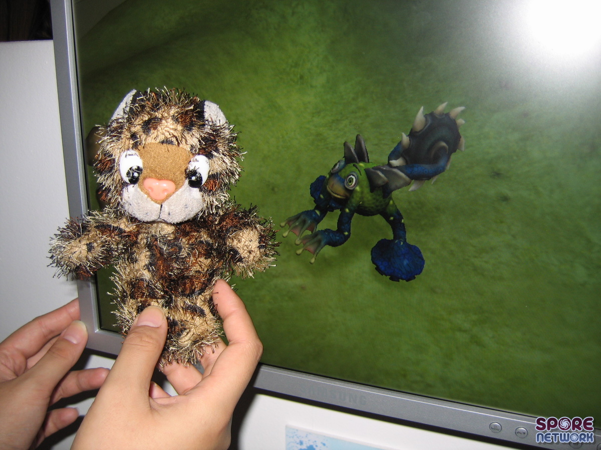 Junior posing with Froggurrr in Spore